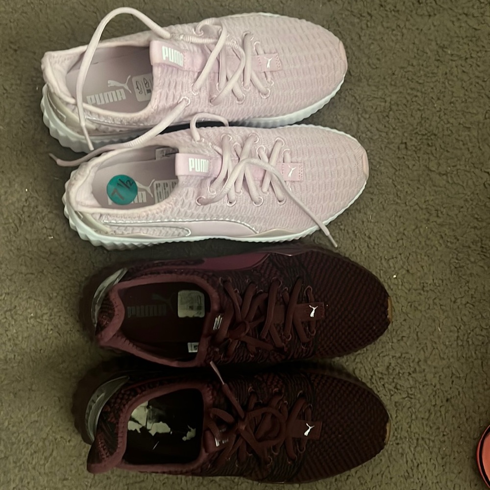 Two pairs of Puma shoes